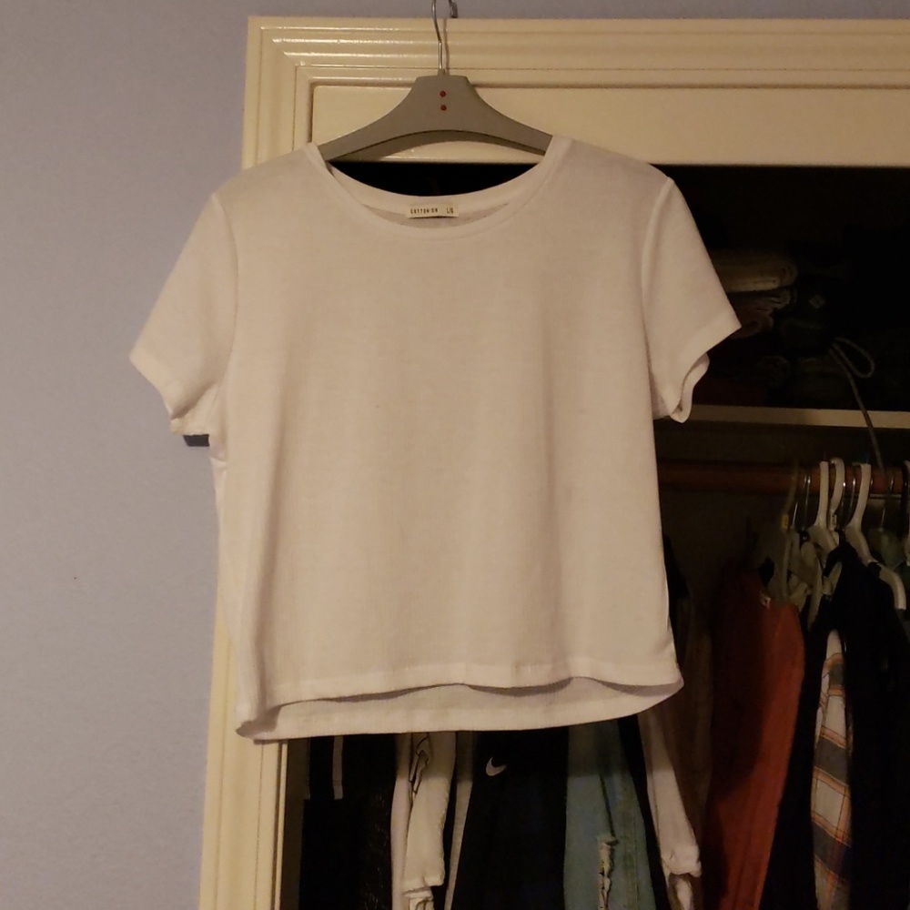 White cropped shirt.
